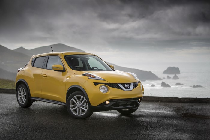 Yellow 2015 Nissan Juke on a Coastal Road