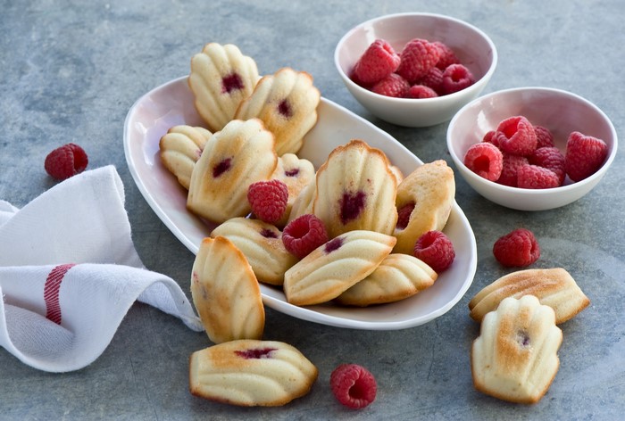 Raspberry Madeleines on a Plate with Fresh Raspberries