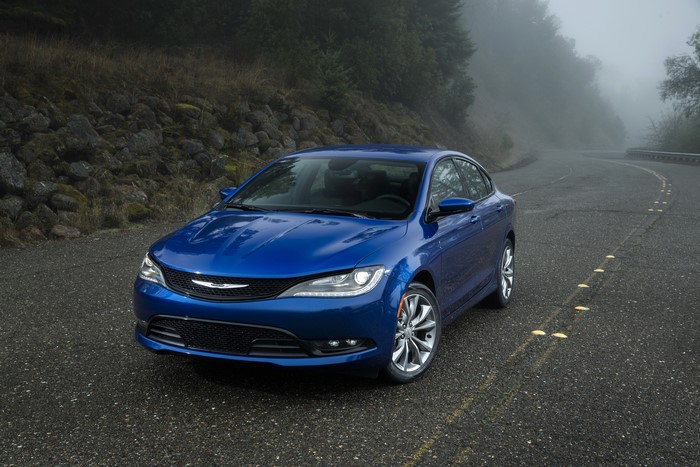 Blue 2015 Chrysler 200 S on a Foggy Road