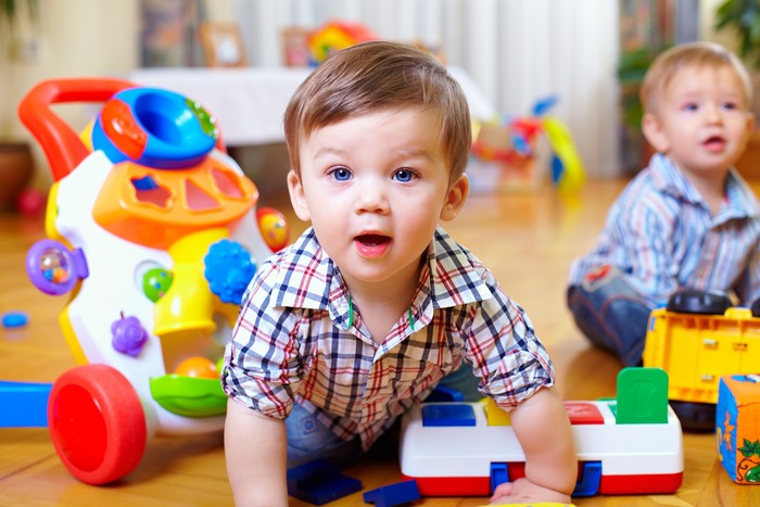 Two Boys Playing with Toys