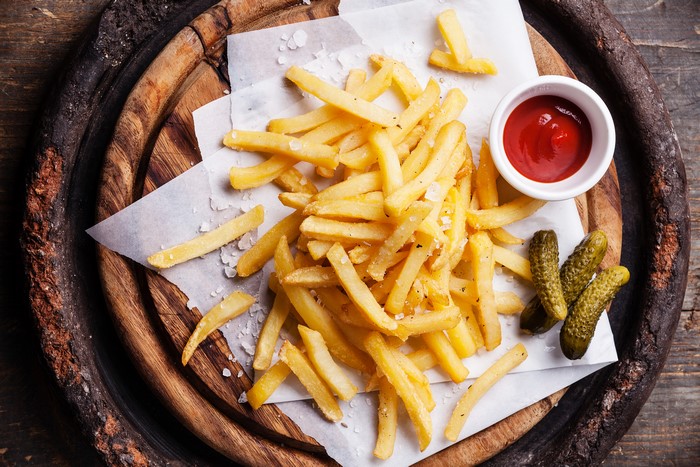 French fries with ketchup and pickles