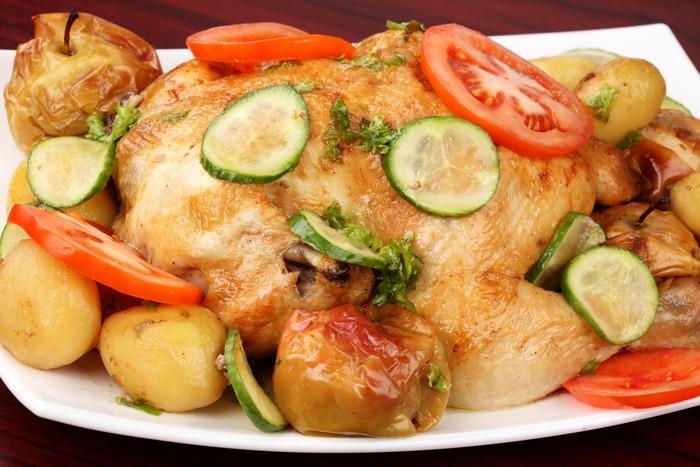 Roast Chicken with Potatoes, Tomatoes, and Cucumbers
