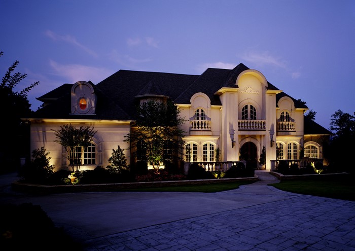 Luxury mansion illuminated at night