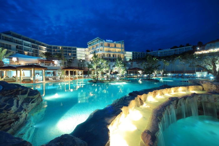 Amfora Hotel Resort with Pools and Waterfalls at Night