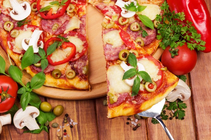 Pizza with Salami, Mushrooms, Olives, and Red Peppers