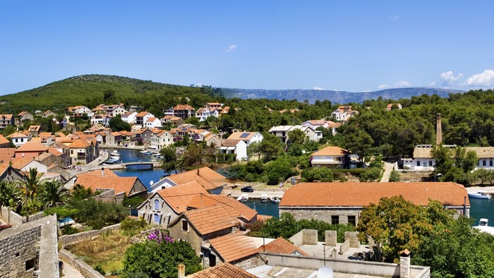 Hvar, Croatia coastal village with red-roofed houses
