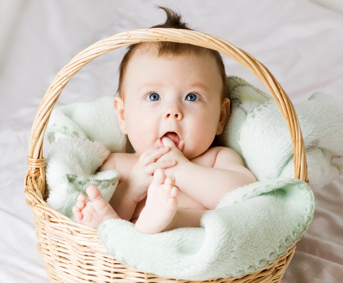 Baby in a wicker basket