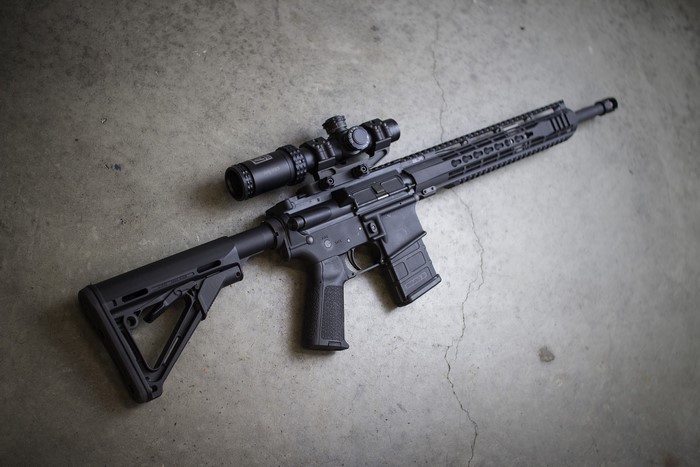 AR-15 style semi-automatic rifle with scope