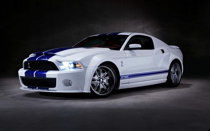 White Ford Mustang Shelby GT500 with Blue Stripes