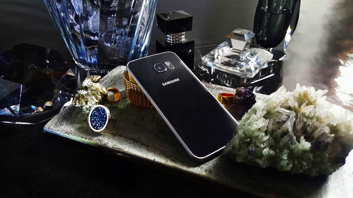 Samsung Galaxy S6 Android Smartphone with Jewelry and Perfume Bottles