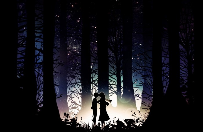 Two figures in a forest at night