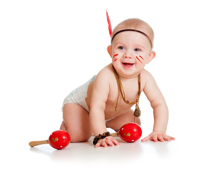Baby dressed as Native American with maracas