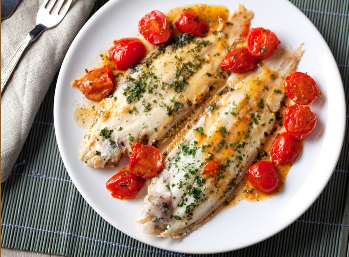 Fish with Tomatoes on a Plate