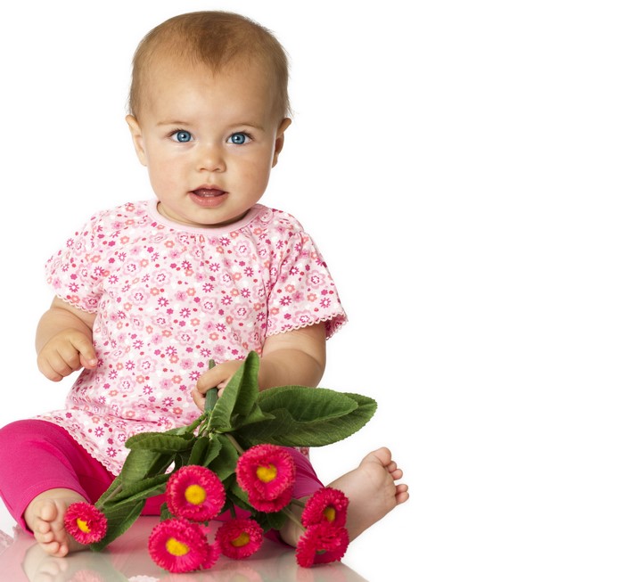 Baby girl with pink flowers