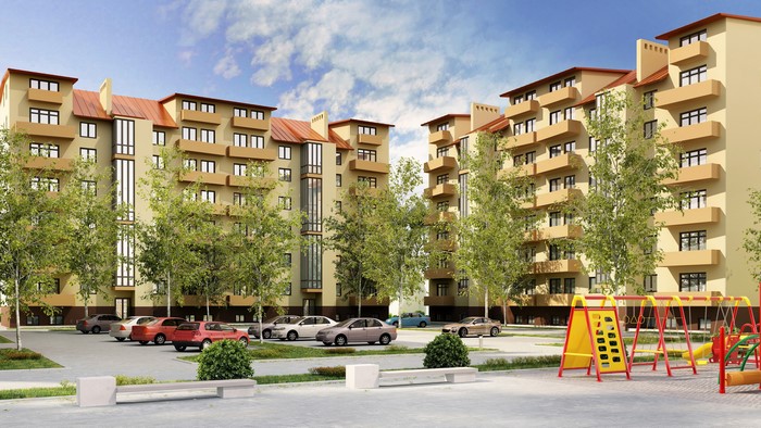 Apartment buildings with balconies and trees