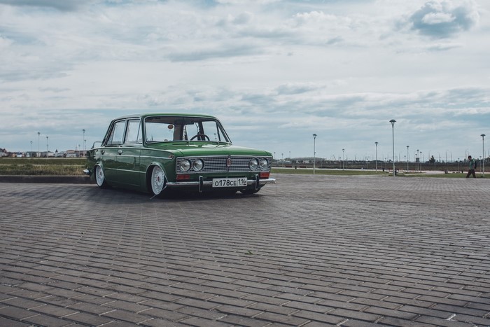 Green VAZ 2103 Lada on a paved lot
