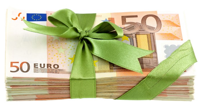 Stack of 50 Euro Banknotes Tied with Green Ribbon
