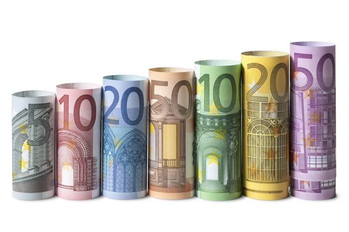 Rolled Euro banknotes in ascending order