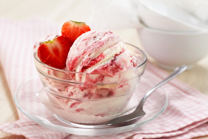 Strawberry Ice Cream in a Bowl with Spoon