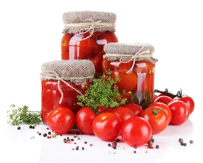 Jars of Preserved Tomatoes with Fresh Tomatoes and Dill