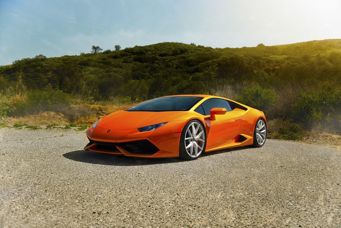 Orange Lamborghini Huracan LP640-4 on Asphalt Road