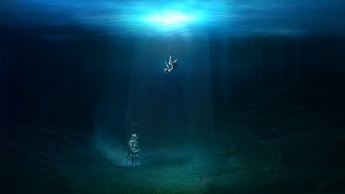 Diver and falling person underwater
