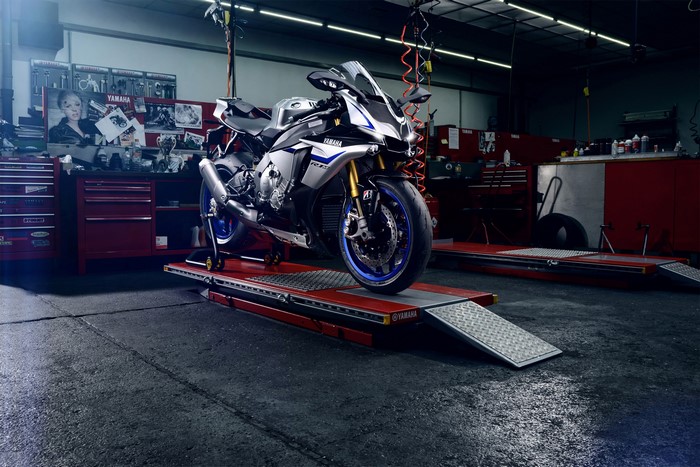 Yamaha R1M motorcycle on a lift in a workshop