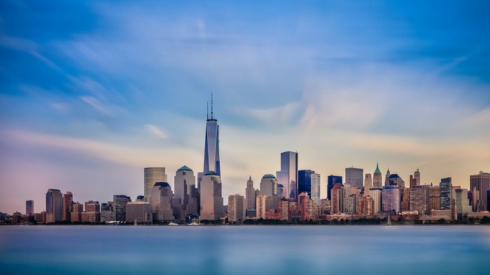 New York City skyline with One World Trade Center over water