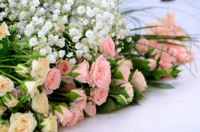 Bouquet of pink and white roses with baby's breath