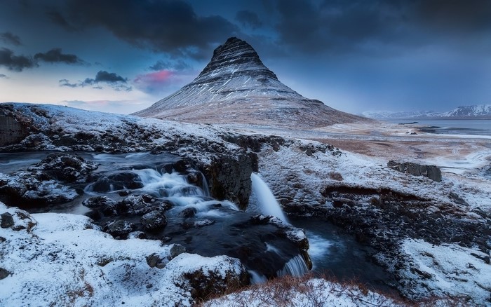 Kirkjufell mountain and waterfall in Iceland during winter