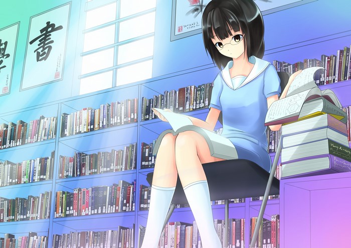 Brunette girl reading in a library with sun rays