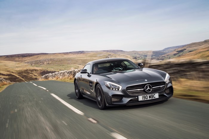Grey Mercedes-Benz AMG GT S Edition 1 driving on a road