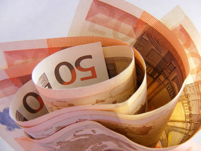 Close-up of rolled 50 Euro banknotes