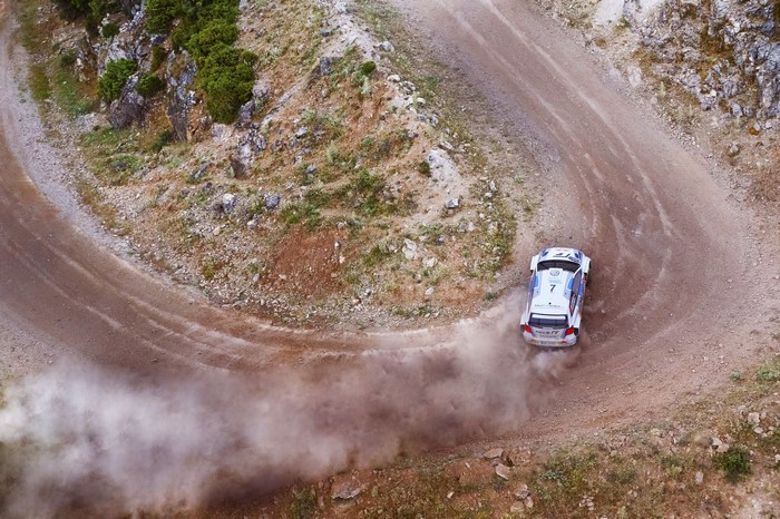 Volkswagen Polo WRC rally car on a dirt road
