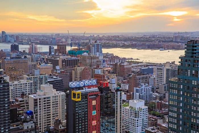 New York City skyline with river and buildings