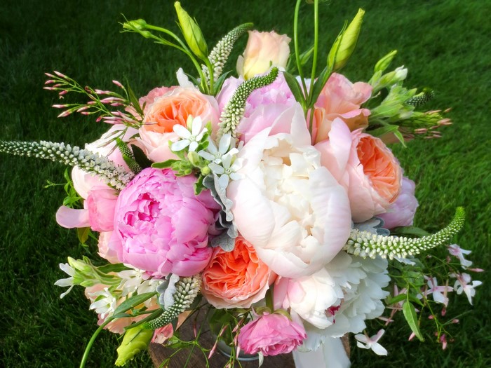 Pink and white peonies and roses bouquet