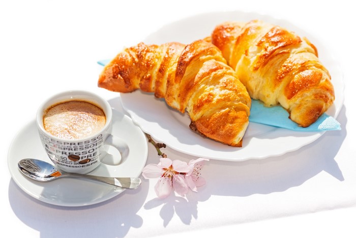 4K Coffee and Croissants on a Plate