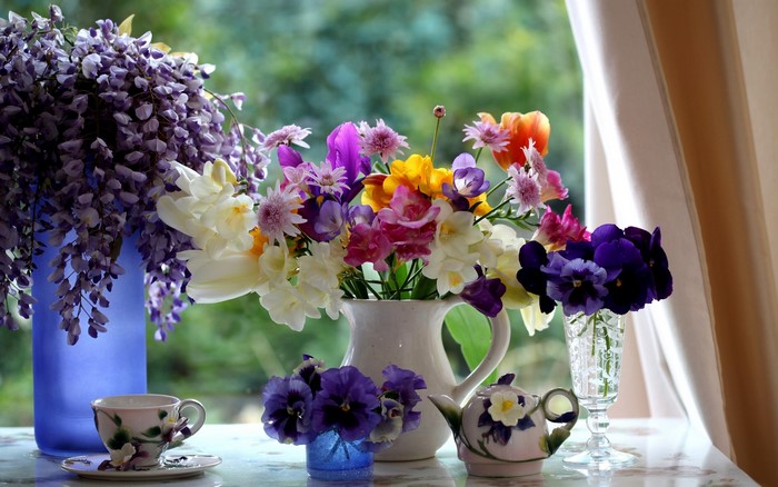 Still life with flowers, cup, and teapot