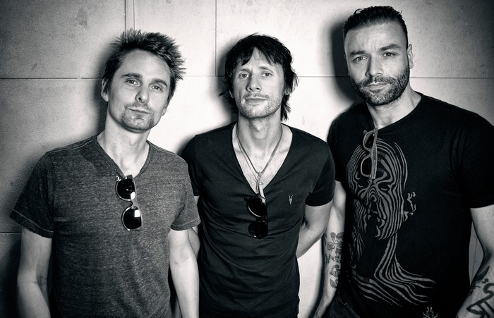 Matthew Bellamy, Christopher Wolstenholme, and Dominic Howard of Muse
