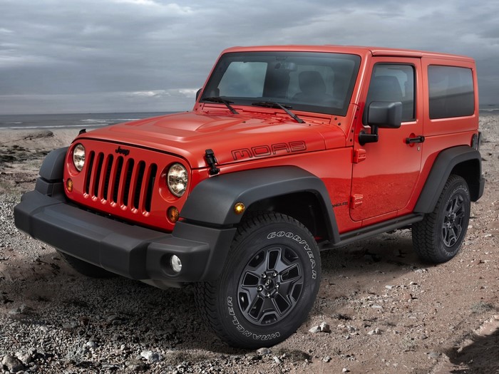 Red Jeep Wrangler Moab on a Beach