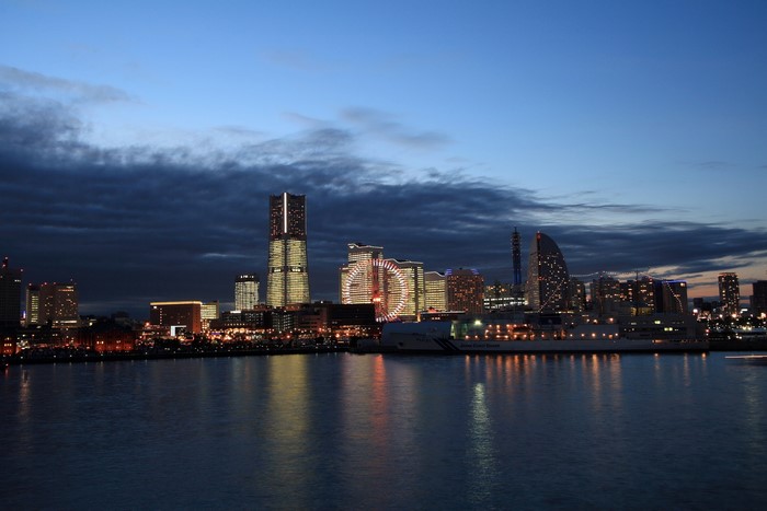 Yokohama skyline at dusk with waterfront and ship