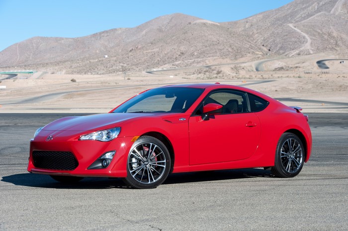 Red 2015 Scion FR-S on a Racetrack