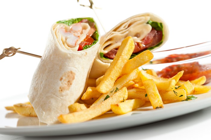 Shrimp wrap with french fries and salsa