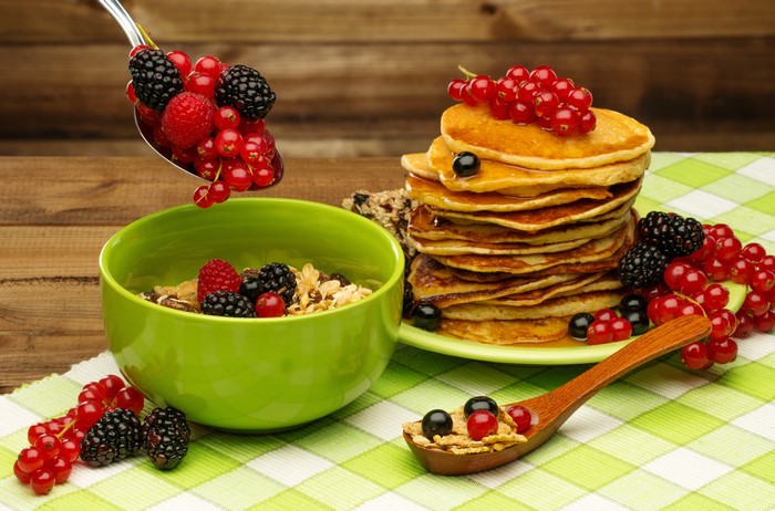 Pancakes with berries and cereal