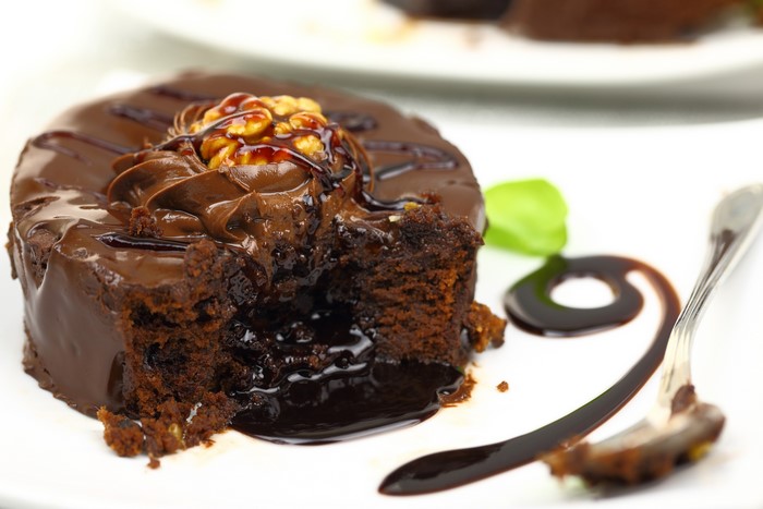 Chocolate lava cake with walnut and chocolate syrup