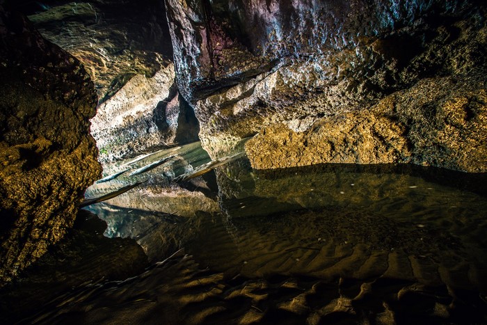 Cave with water and rock formations