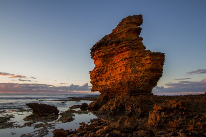 Rock formation on the coast at sunset