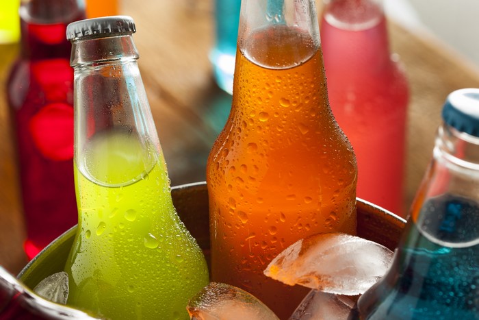 Assorted Colorful Soda Bottles with Ice