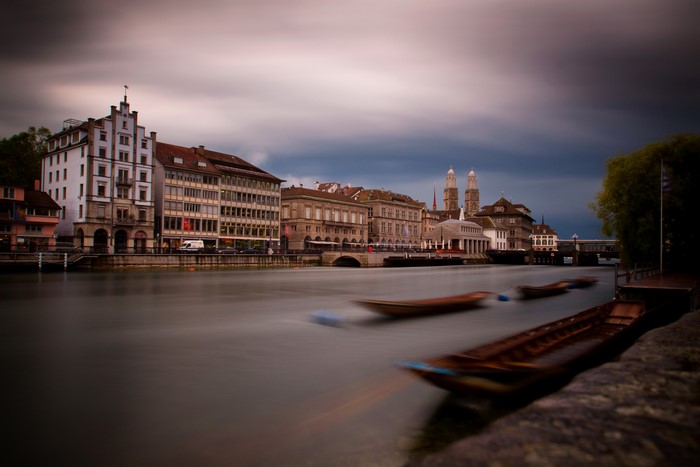 Riverfront buildings and boats in Zurich, Switzerland