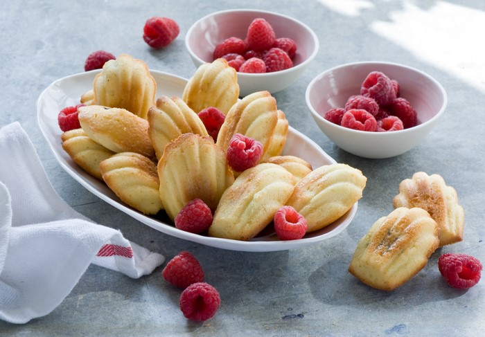 Madeleines with Raspberries on a Plate